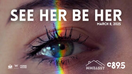 See Her Be Her show poster image featuring a close up of a woman's eye with rainbow light shining on it